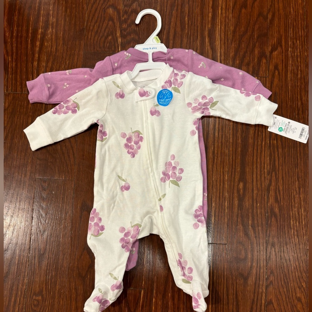 Carters sleep and play pajamas 2 pack. Never worn NwT. Size 3 M
